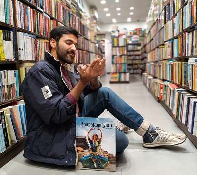 Dr. Varun Khanna with Bharatnatyam book